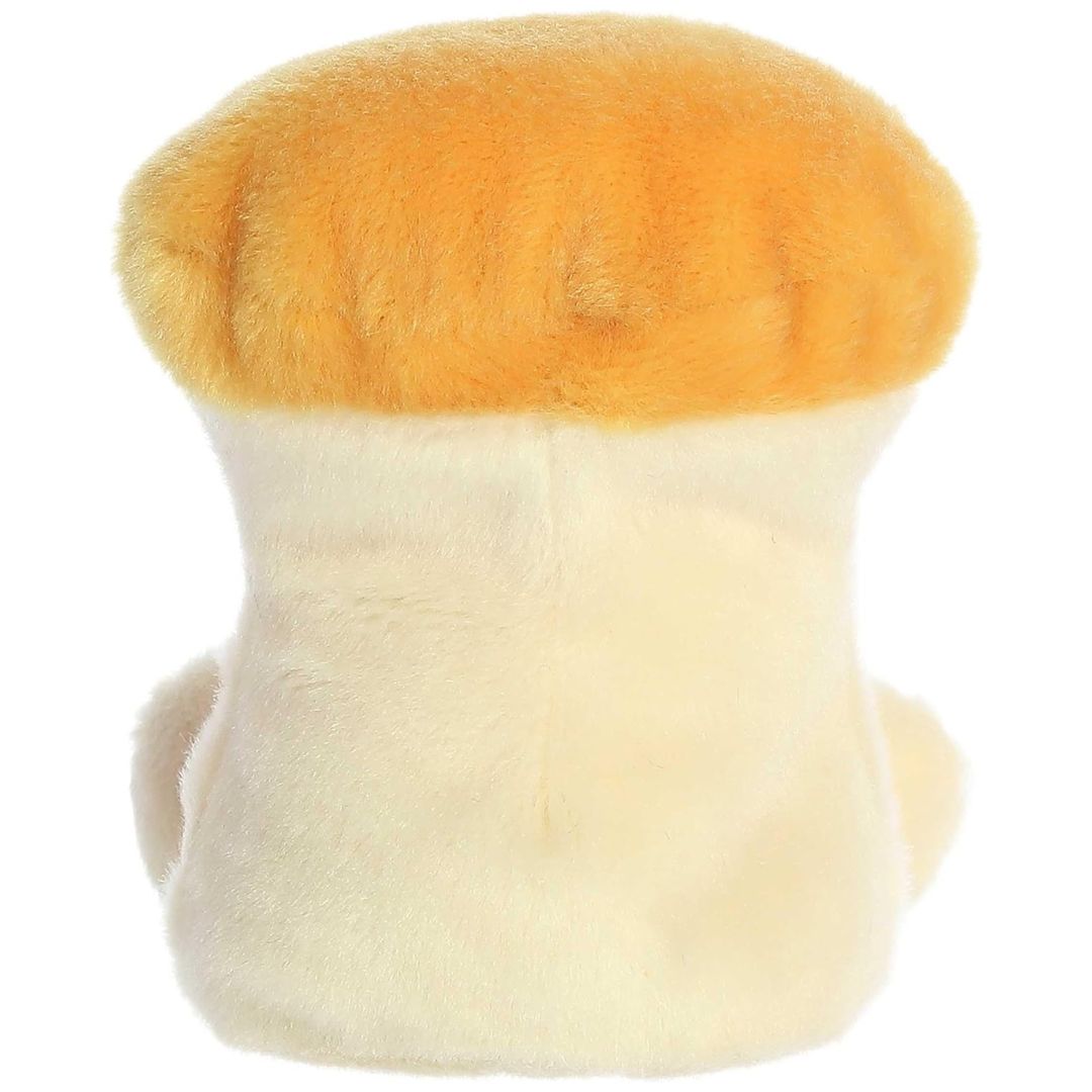 Rear view thumbnail of the Aurora mushroom stuffed toy displaying its smooth, solid cream backing and the reverse of its orange cap.