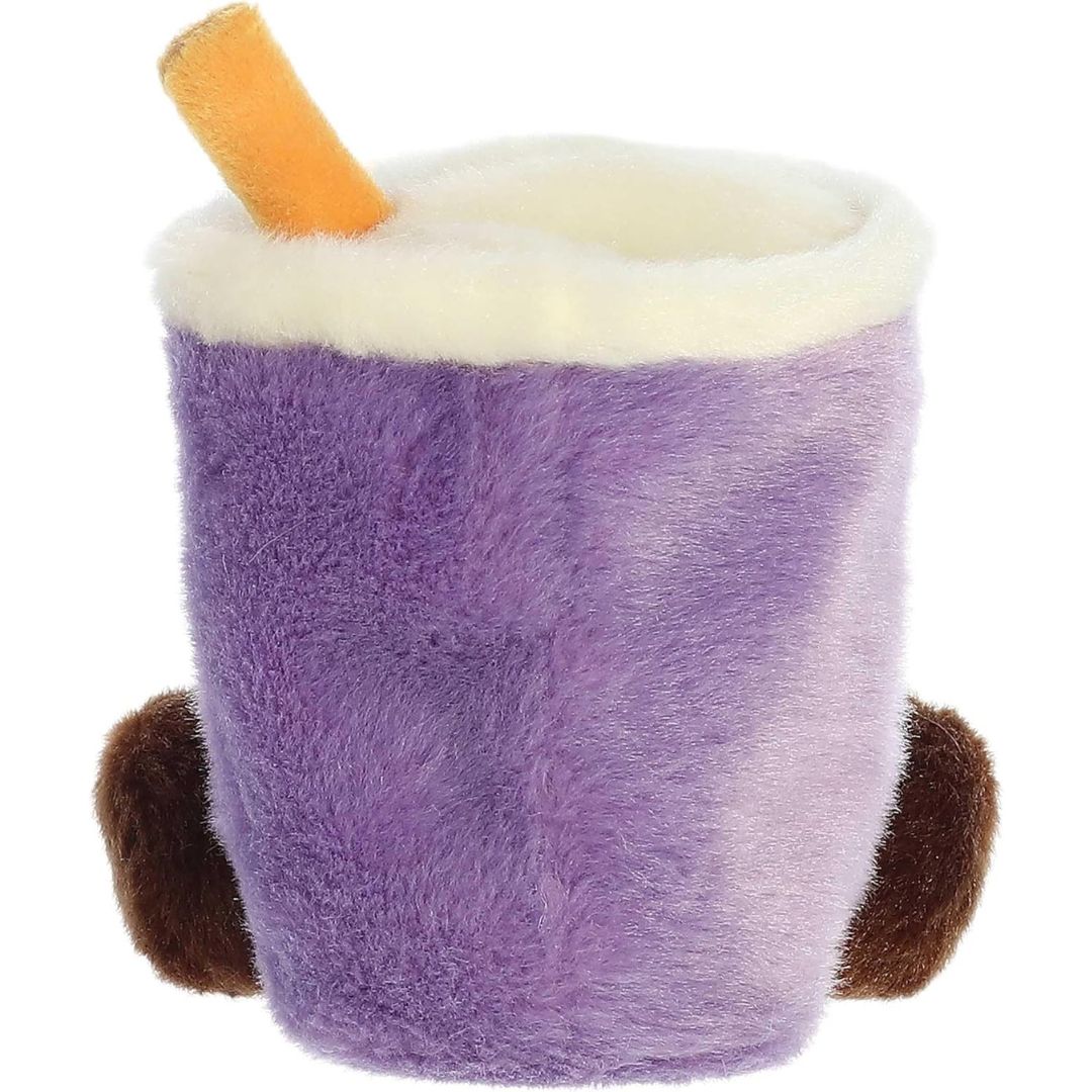 Rear view thumbnail of the Aurora boba stuffed toy displaying its smooth, solid purple plush backing, cream foam layer, and dark brown feet from behind.