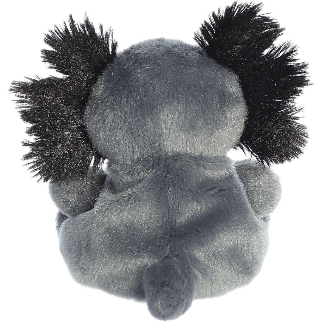 Rear view thumbnail of the Aurora axolotl stuffed toy displaying its smooth gray plush back, flared black fluffy gills, and tail.