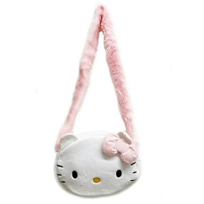 Full length view of the Hello Kitty plush crossbody bag showing the long, fluffy pastel pink shoulder strap fully extended and ready to wear.