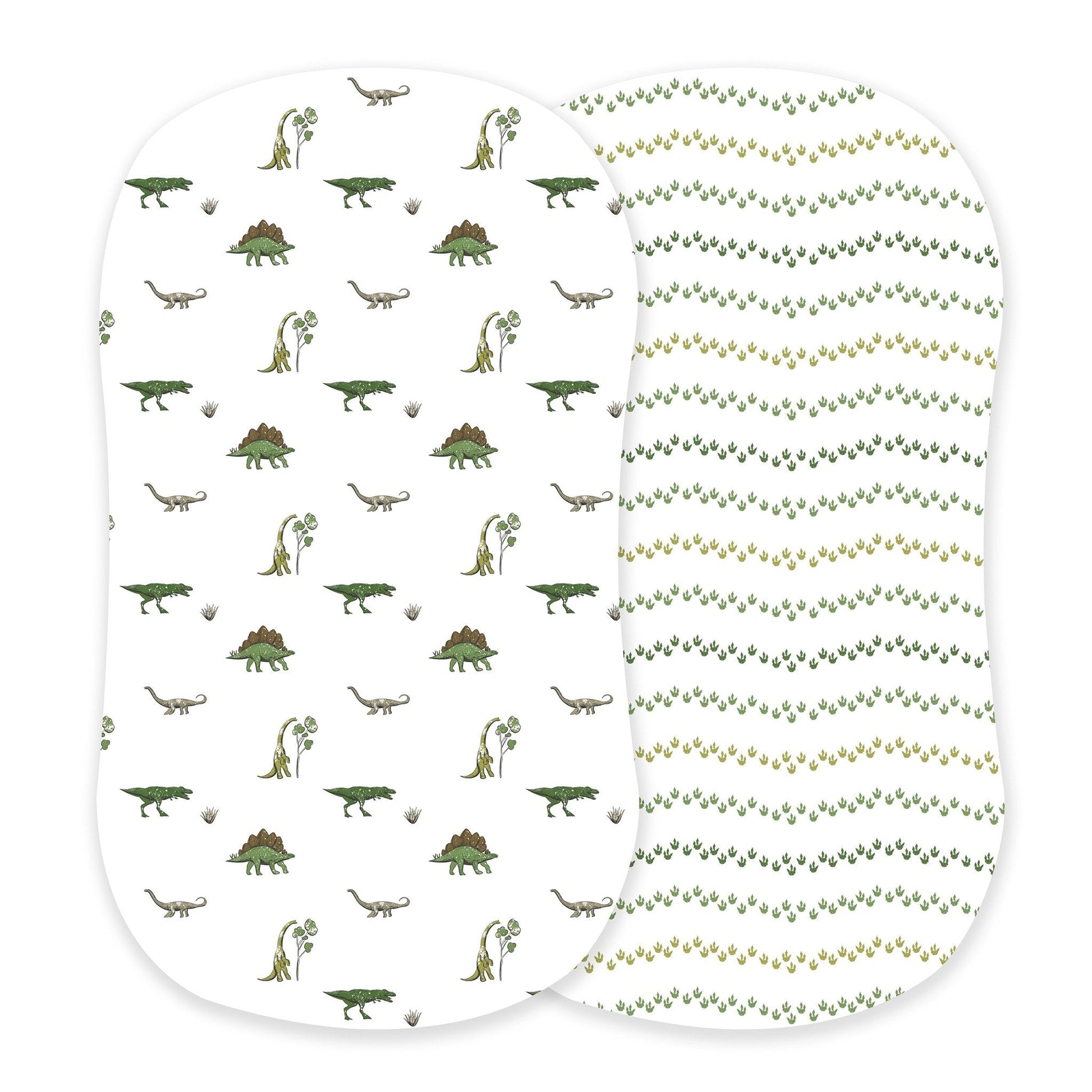 Newcastle Classics two-pack cotton bassinet sheets showcasing the Dino Days dinosaur scene print and green Dino Feet tracks print side-by-side.