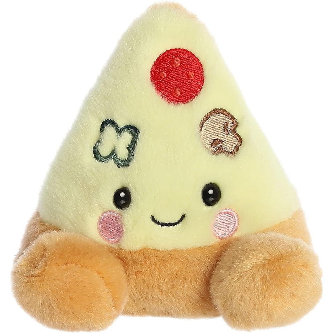 A stuffed animal plush toy shaped like a pizza slice with a happy face, beige cheese-like topping, and red and green toppings.