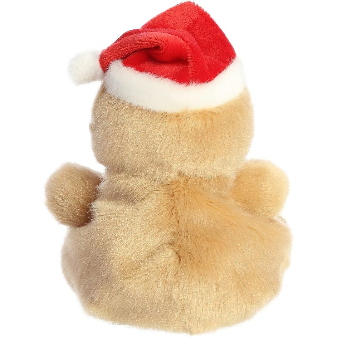 Rear view thumbnail of the Aurora gingerbread stuffed toy displaying its smooth, golden-brown plush backing and the back of its festive red hat.