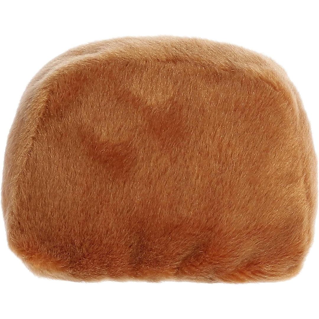 Rear view thumbnail of the Aurora fruitcake stuffed toy displaying its smooth, solid warm brown plush backing.