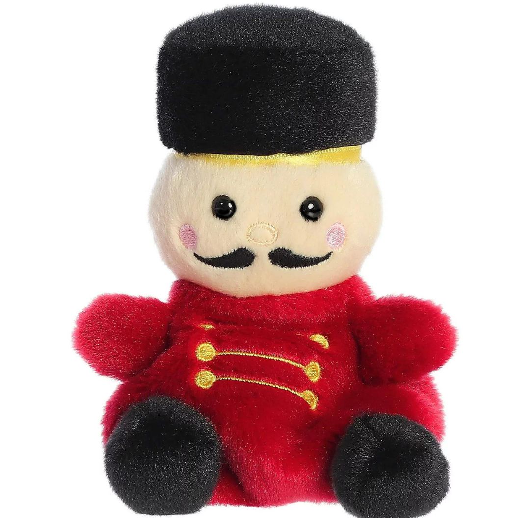 Front view thumbnail of the cute Marius Nutcracker plush sitting straight, highlighting its dark safety eyes, rosy pink cheeks, and small black plush boots.