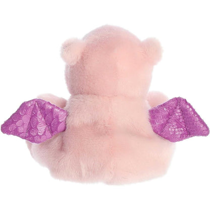 Back view of Aurora Palm Pals Aria Pink Dragon plush showing purple glitter wings.