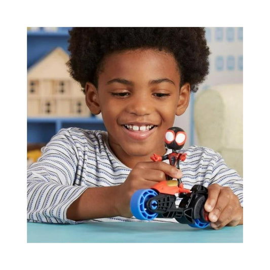 Lifestyle play thumbnail showing a child playing on a table with the Miles Morales 4-inch action figure seated on his motorcycle.