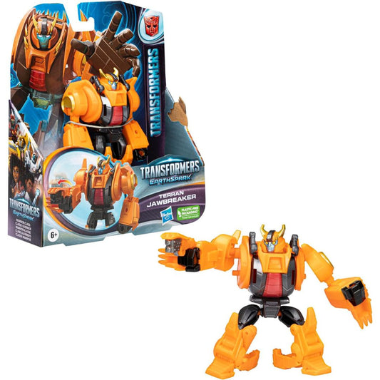 Transformers EarthSpark Warrior Class Terran Jawbreaker 5-inch action figure packaging box next to unboxed orange robot figure.